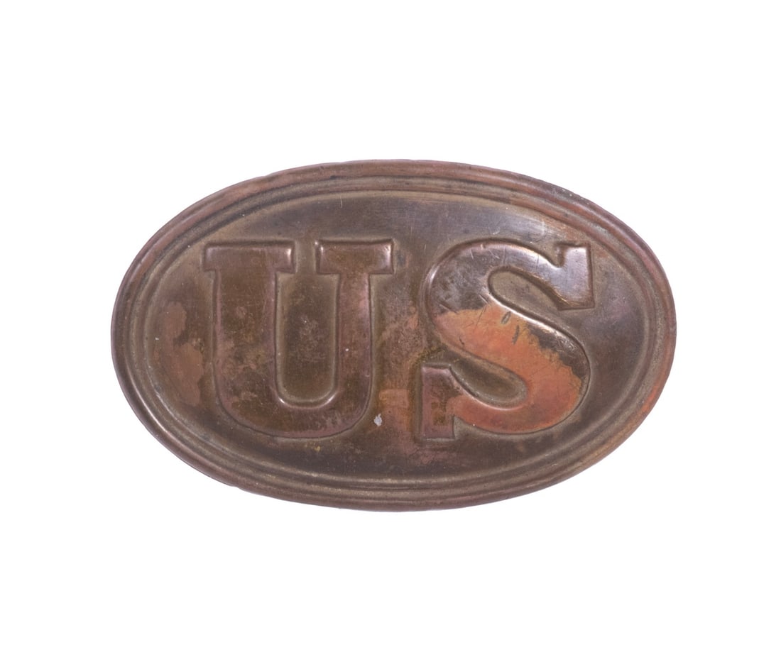 IDENTIFIED CIVIL WAR 6thTH MAINE REGT UNION BELT PLATE: Battle Worn oval US brass waist belt plate with lead filling, arrowhead hooks, and long prong pattern, 2" x 3 1/4", scarred from use. OS: 2 x 3 1/4 in. (5.1 x 8.3 cm.)