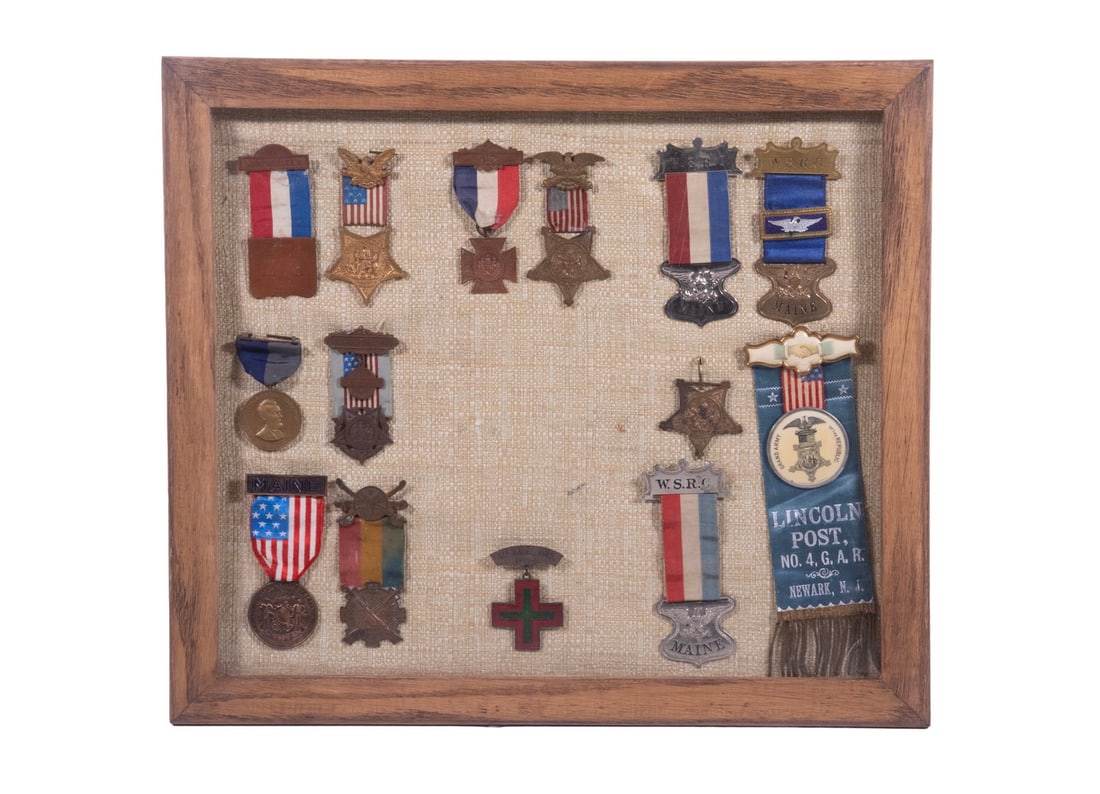 FRAMED COLLECTION OF (14) GAR MEDALS & RIBBONS: Including: "64-81 Winchester" 6th Maine Regt bronze medal; Grand Army of the Republic Medal version 1 in gilt brass w/ US flag ribbon; (2) 1883 Maine Women's Relief Corp in brass w/ tricolor ribbon; (