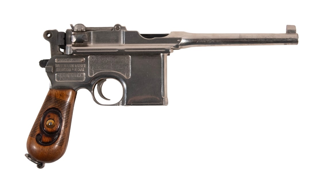 NICKEL MAUSER C96 PISTOL, 7.63 MAUSER: An offering of a rare factory-nickeled Mauser C96 pistol. This showy pistol features a smooth nickel finish throughout with a blued bolt and safety lever. There have been some modifications to the pis