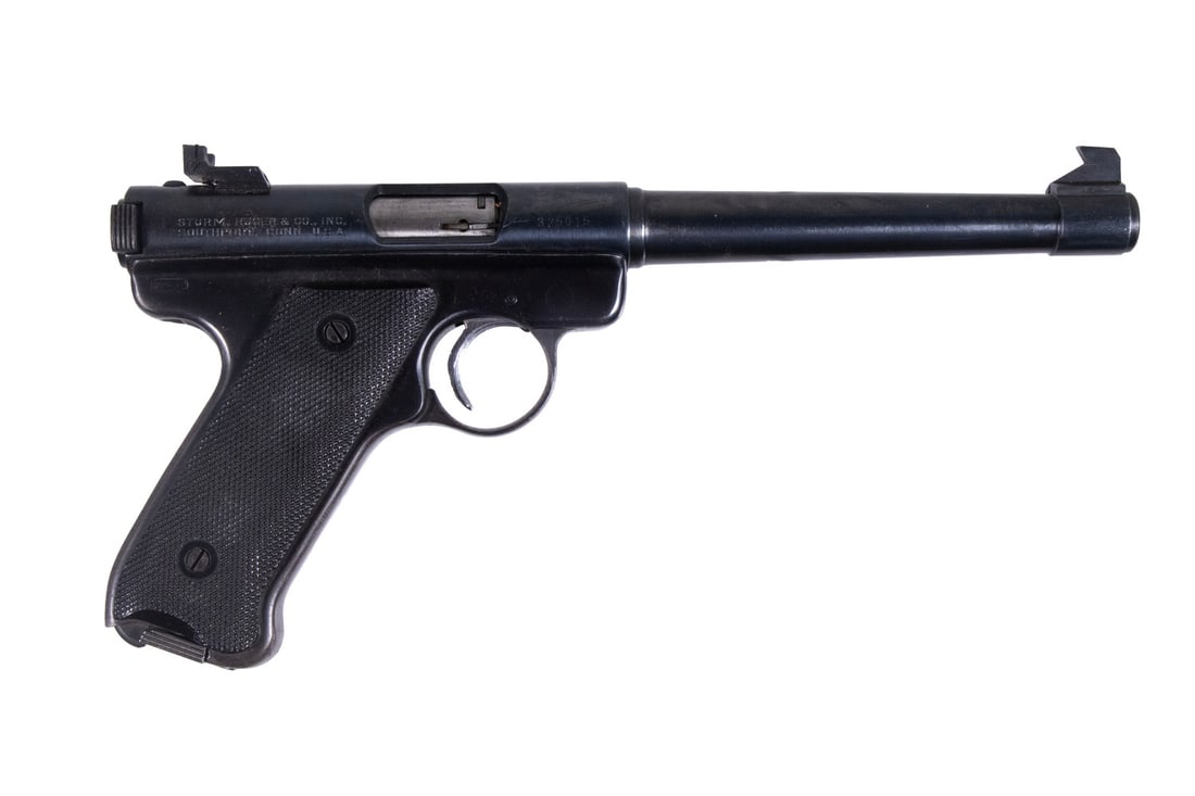 RUGER MARK I PISTOL, .22 LR: An offering of an early example from Ruger's iconic line of rimfire pistols. The Mk. I features a round barrel and receiver mated to a steel frame, all in a deep blued finish with checkered black plas