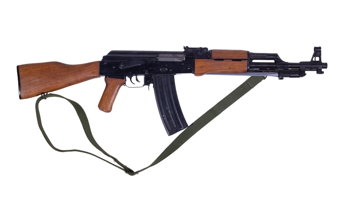 POLYTECH AKS-223 RIFLE, 5.56x45mm: An offering of a highly-collectible AK-pattern rifle made under the Polytech name in China. These rifles were manufactured for the U.S. consumer market and as such were chambered for the NATO adopted