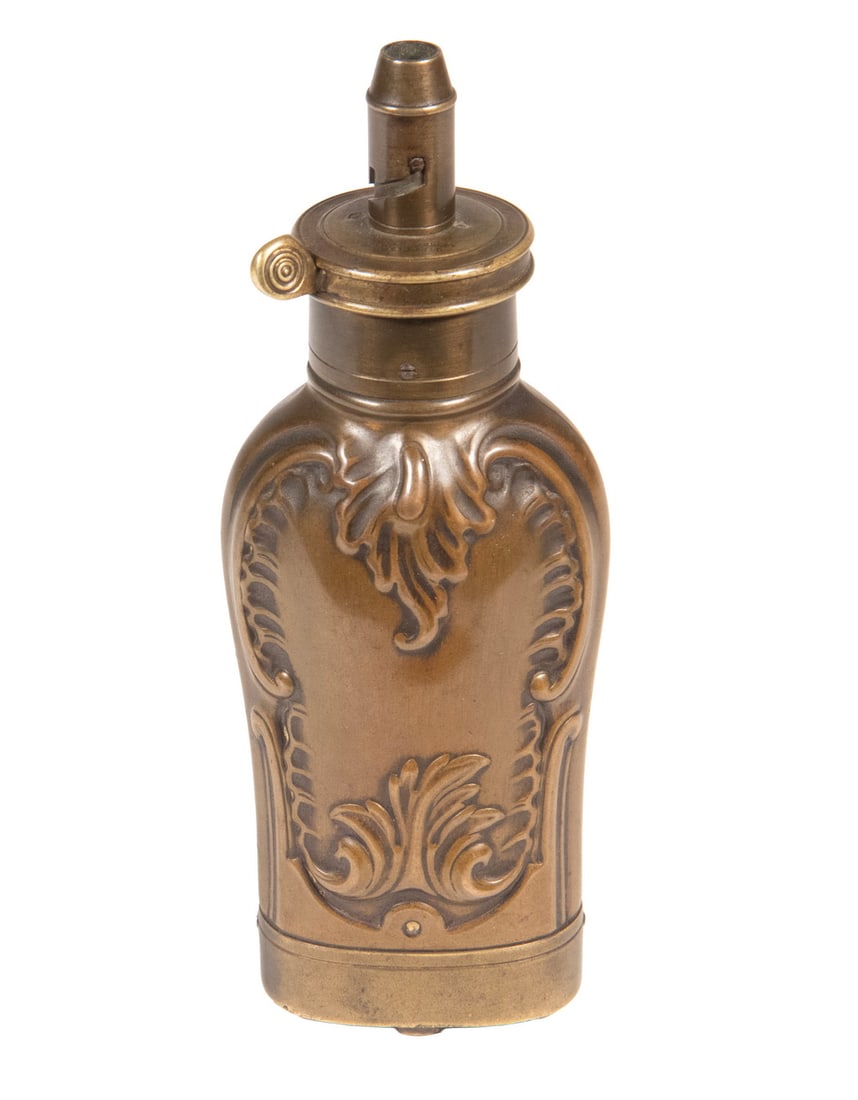 G. & J. W. HAWKSLEY POWDER FLASK: An offering of a unique, multi-compartment brass powder flask made by G. & J. W. Hawksley of Sheffield. The flask features a screw off top with a volume-adjustable nozzle and a spring-latch gate, and