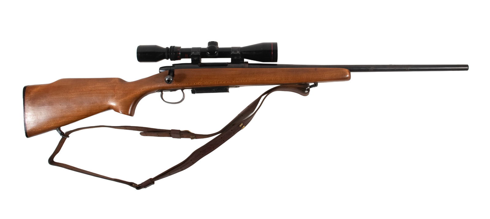 REMINGTON MODEL 788 RIFLE W/ SCOPE, .308 WIN: An offering of an incomplete hunting rifle made by Remington. The rifle features a blued barrel and frame mounted to to a smooth walnut stock with raised cheekpiece. The rifle is mounted with a variab