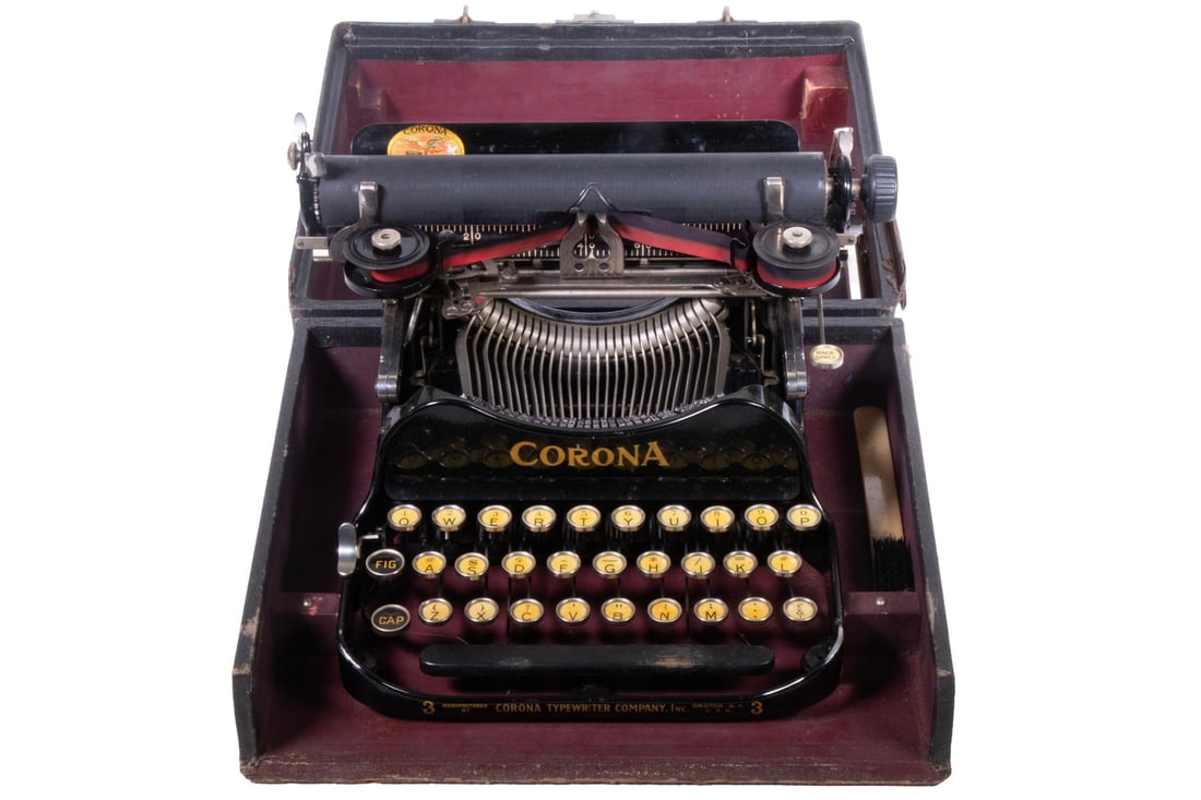 CORONA FOLDING PORTABLE TYPEWRITER MODEL 3: In case, MFG 1912-1941, includes original purchase receipt from 1935 for $449.50. In fine working condition, lower flap of frame missing.Per myTypewriter.com: The No. 3 has three banks of keys and a d