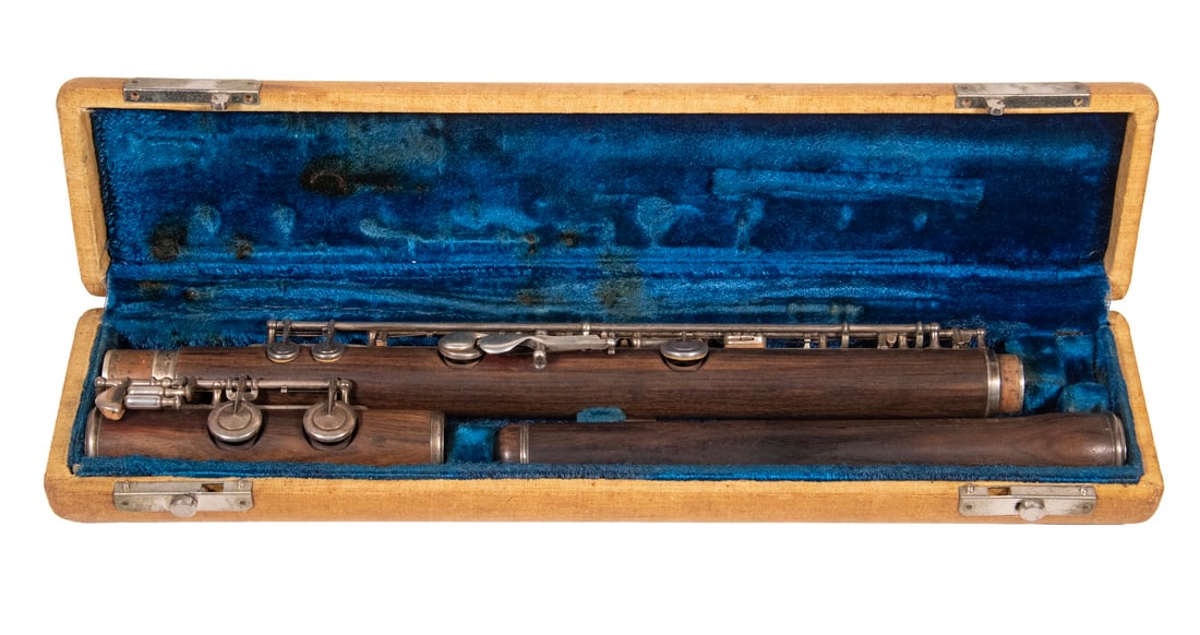 RUDALL, CARTE & CO. ROSEWOOD FLUTE WITH SILVER KEYS, LONDON, 19TH CENTURY: A Boehm-system flute by Rudall, Carte & Co., London, serial no. 2341, stamped “Rudall, Carte & Co., 23 Berners Street, Oxford Street, London” on the body. Constructed in three sections wit