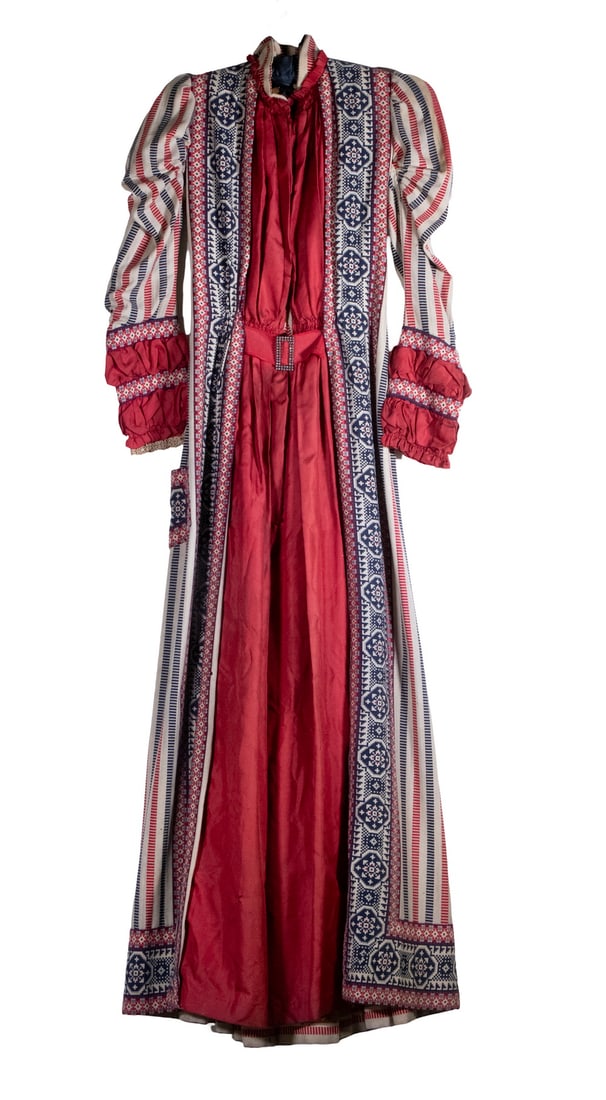PATRIOTIC YOUNG LADIES PARADE DRESS, CIRCA 1890: Red, White and Blue Dress in wool flannel and polished cotton, with a faux diamond buckle at the red front, leg-of-mutton sleeves. Tan cotton lining. 12" shoulder, 20" sleeves. Minor moth loss. Waist: