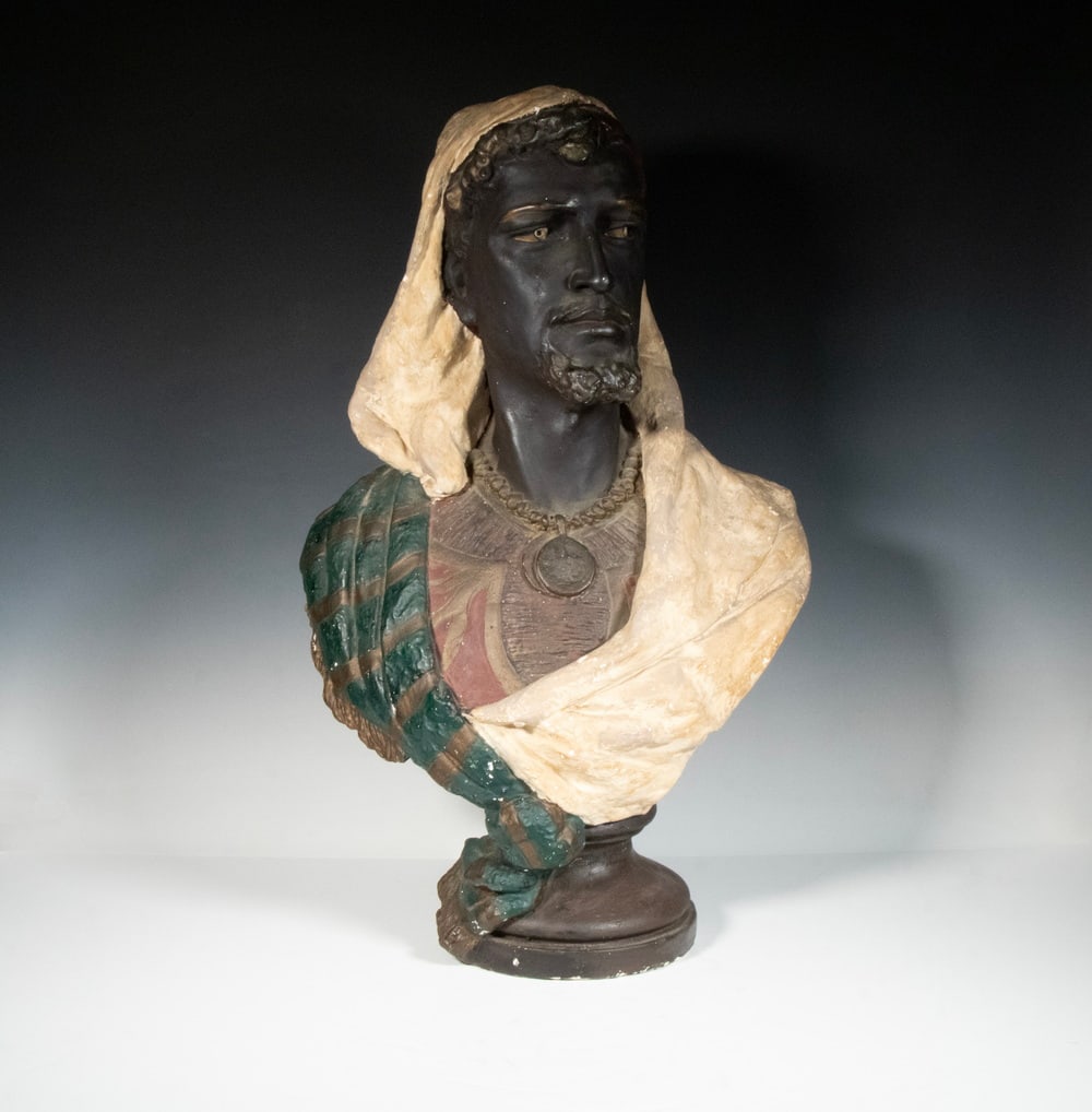 AFTER EDUARD STILLMACHER (GERMANY, 1868-1929): Bust of an Arab Man, cast ad painted plaster, unmarked.Some flakes, scuff. 27 x 17 x 10 in. (68.6 x 43.2 x 25.4 cm.)