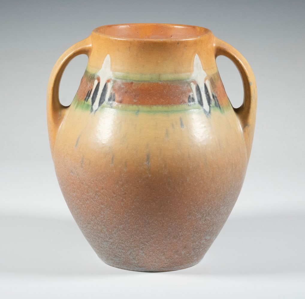 ROSEVILLE "MONTACELLO" VASE: 1930s Era Arts & Crafts Pottery Jar by Roseville, "Montacello Tan" pattern, ovoid shape with side handles, with Roseville paper label affixed to the base. 9 1/2 x 7 3/4 x 7 3/4 in. (24.1 x 19.7 x 19.7