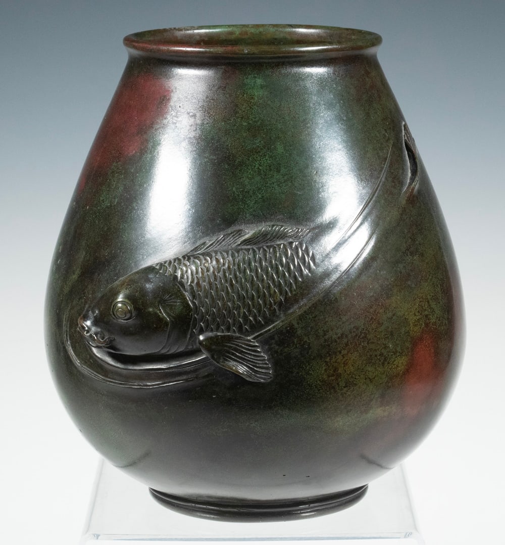 MEIJI PERIOD JAPANESE BRONZE CARP VASE, SIGNED: Cast in dark patinated bronze with a high-relief carp, finely detailed with naturalistic features, signed. Good condition. 8 3/4 x 8 x 8 in. (22.2 x 20.3 x 20.3 cm.)