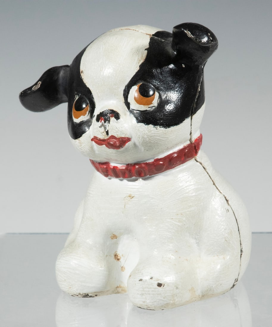 1930s HUBLEY CAST IRON FIDO COIN BANK: 1930s Era Painted Iron Coin Bank, by Hubley Manufacturing Company (Lancaster, PA), with "Fido" embossed collar and floppy ears, cast in two parts and held together with a single screw. 5 x 3 x 4 in. (