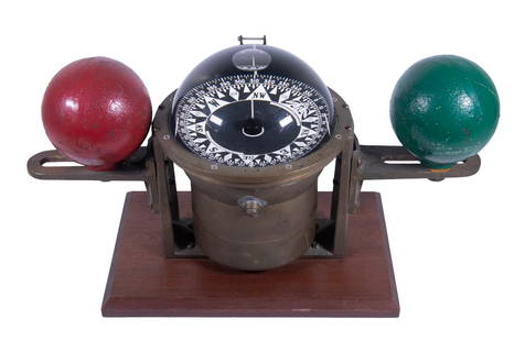 KELVIN WHITE CONSTELLATION BINNACLE MARINE COMPASS: Wet Compass by Wilfred B. White & Sons, New York, Boston & Baltimore, in Bronze Binnacle Mount by Kelvin White, with quadrantal spheres, rim stamped "Pat 242 8346, Constellation CCF2404". On mahogany