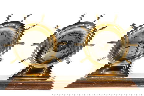 SALEM BRASS SHIP'S BELL CLOCK & BAROMETER DESK SET: Solid Brass Marine Set of Clock and Barometer on Stand, marked on dials "Salem Ship's Bell" & "Salem Compensated", in ship's helm form, on molded mahogany base. OS: 10 3/4 x 18 1/2 x 6 in. (27.3 x