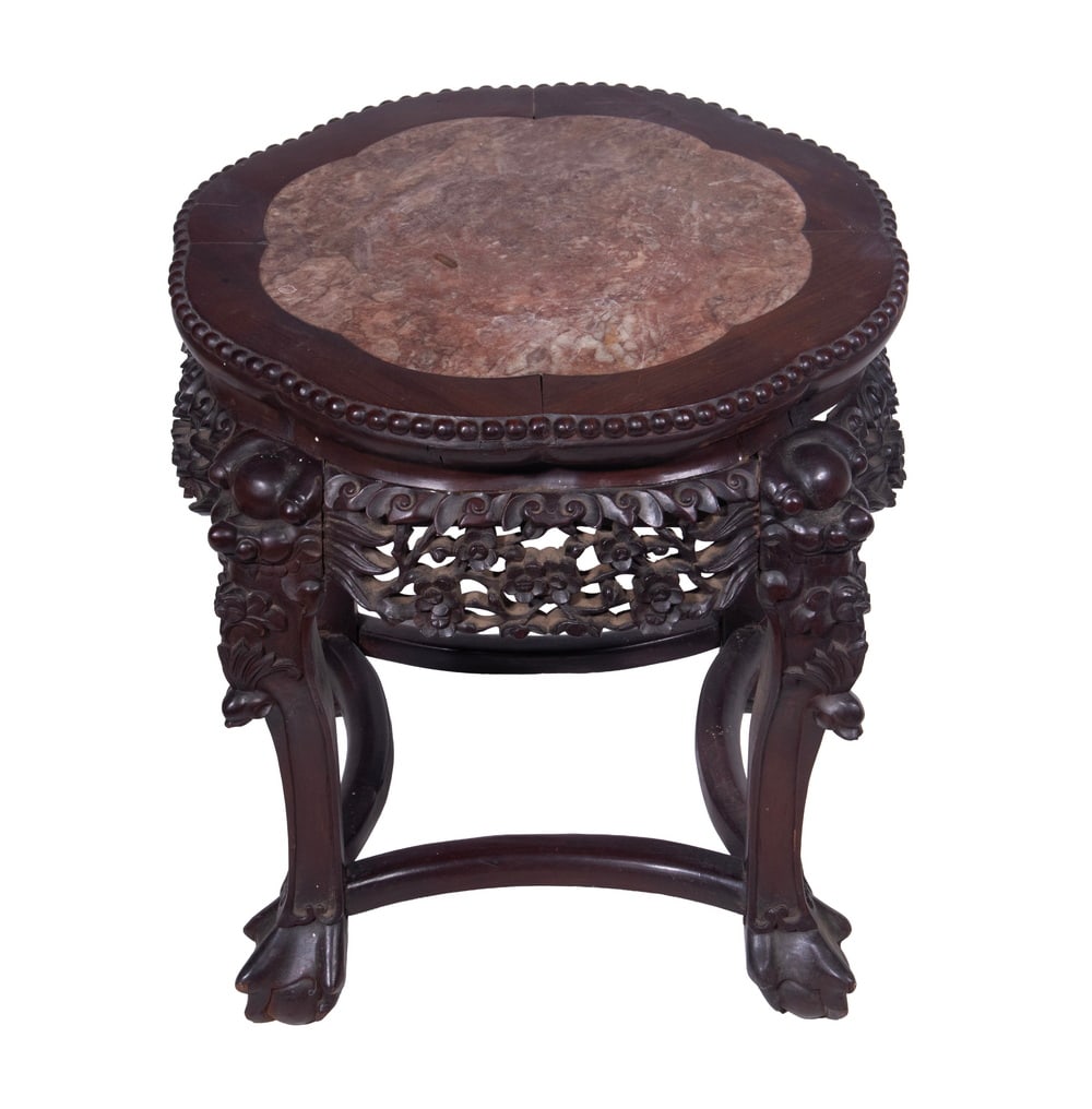 CHINESE EXPORT STONE TOP LOW TABLE: Early 20th c. Side Table, having a shaped top with carved beaded edge and central stone insert, with intricately carved and reticulated frieze, set on curved legs and stretcher base, with ball and cla