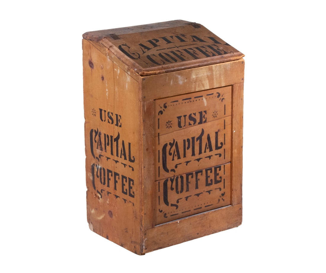 EARLY COUNTRY STORE PAINTED CAPITAL COFFEE BOX: Circa 1900 Wooden Merchandising Bin, promoting Capital Coffee, with iron-hinged slanted lid stenciled "The Ohio Coffee & Spice Co., Columbus, O., Capital Coffee", the front and sides stenciled "Use Ca