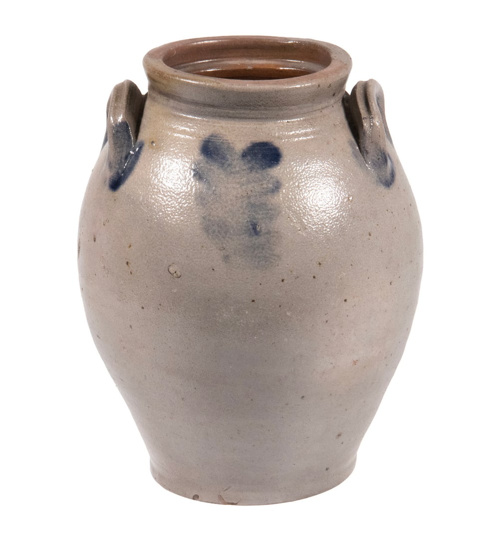 OVOID SALT GLAZED STONEWARE CROCK: Early 19th c. 1-Gallon Jar, likely Virginia or Pennsylvania, with cobalt slip trailed foliate decoration, flat rim with tooled shoulder, applied lug handles with cobalt highlights. 10 x 7 x 7 in. (25.