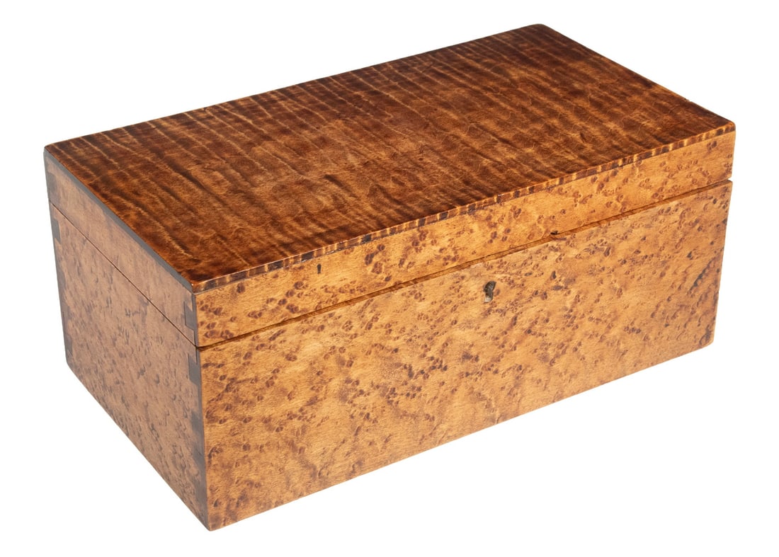 FIGURED MAPLE TRINKET BOX: Vintage Finely Crafted Rectangular Box, with dovetailed corners, having a tiger maple lid and birdseye maple side panels. 4 1/2 x 10 1/2 x 5 3/4 in. (11.4 x 26.7 x 14.6 cm.)