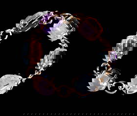 14K GOLD REVERSIBLE BRACELET WITH TWELVE QUARTZ GEMSTONES, WILLIS ROCK, MAINE: A 14k yellow gold bracelet set with (12) cabochon quartz gemstones, each double-sided in open mounts, showcasing contrasting varieties such as amethyst, citrine, rose quartz, and rock crystal; marked