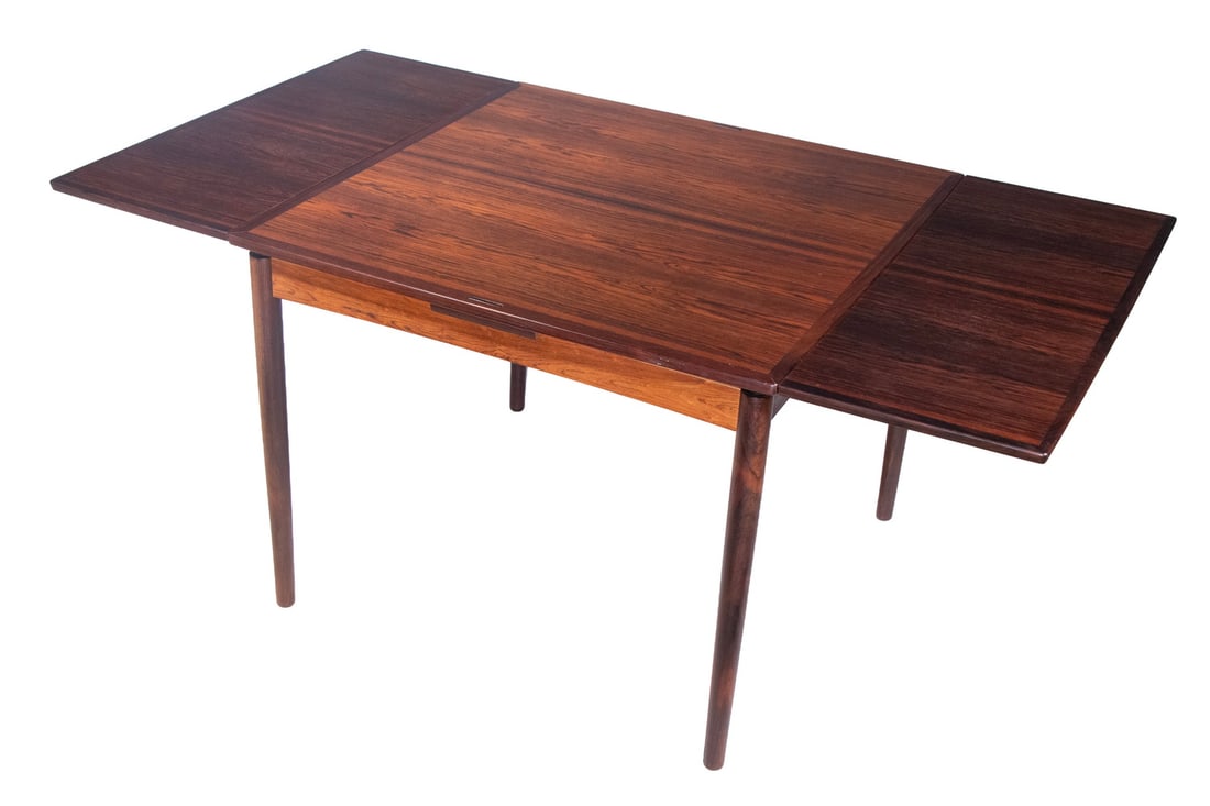 POUL HUNDEVAD MID CENTURY REVERSIBLE ROSEWOOD TABLE: Danish Modern Dining and/or Card Table, ca. 1970s, designed by Poul Hundevad for Illums Bolighus, Copenhagen; the top is reversible -- one side with a rosewood surface and the other, with a leather in