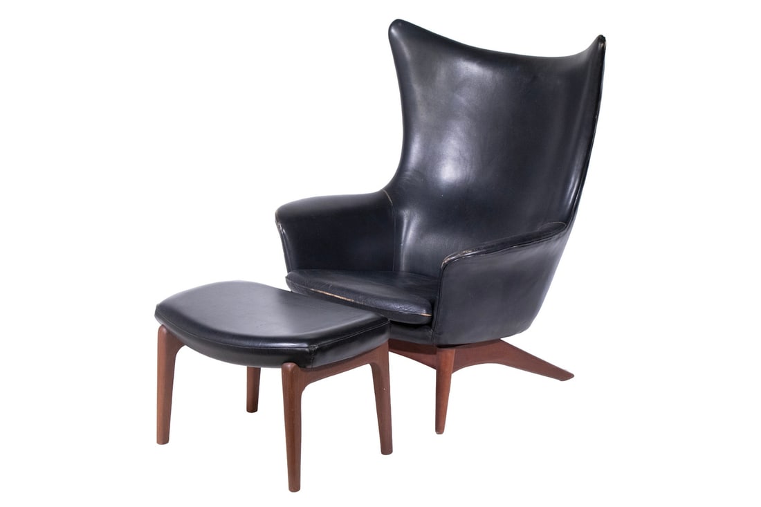 MID CENTURY RECLINING LEATHER LOUNGE CHAIR & OTTOMAN: Scandinavian Lounge Chair and Ottoman, ca. 1970s, in black leather and teakwood; the reclining chair by H.W. Klein for Bramin Mobler, Denmark; and the ottoman by L.H. Hielle, Norway, with affixed labe