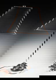 MID-CENTURY MODERN CHROME TABLE LAMP WITH BLACK SHADE: Featuring a sleek chrome-plated base with a curved stem and original black fabric shade. Fitted with a Leviton socket (250W 250V, Made in U.S.A.). OS: 25 x 16 x 9.1/6 in. (63.5 x 40.6 x 23.3 cm.)