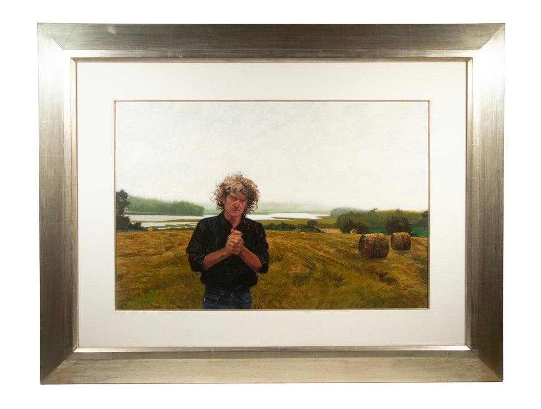 RONALD FRONTIN (MAINE, 1962 -): Marsh Hawk (Self-Portrait), acrylic on board, signed lower right, depicting himself clasping his hands in a newly mown hayfield, the ribbon of a Maine inlet behind, housed in a broad silver leaf miter
