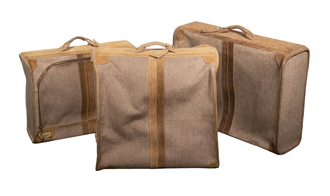 (3 PC SET) HARTMANN STYLE LUGGAGE: Unmarked, early 1980's brown suede leather with heavy treated dark tan buckram body, large and small suitcases and suit bag, all with brass zippers, roto locks (unknown combo), 18" x 24" x 8"; 28" x