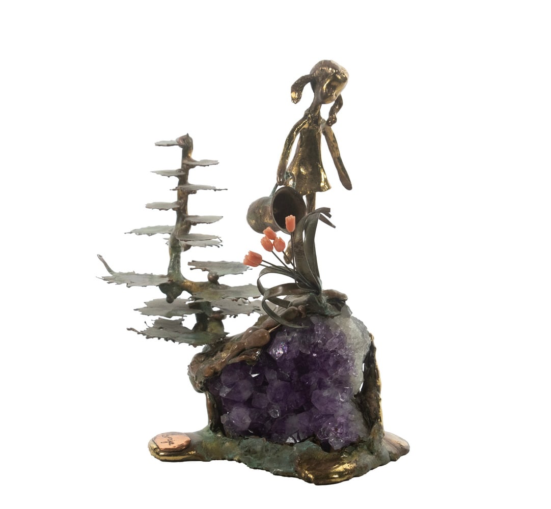 BRONZE AND AMETHYST “GIRL WITH FLOWERS” SCULPTURE, SIGNED BORJA: A vintage whimsical mixed-media sculpture featuring a stylized bronze girl watering coral flower beside a torch-cut bronze tree, mounted on a natural amethyst geode base. Signed "Borja" on a copper