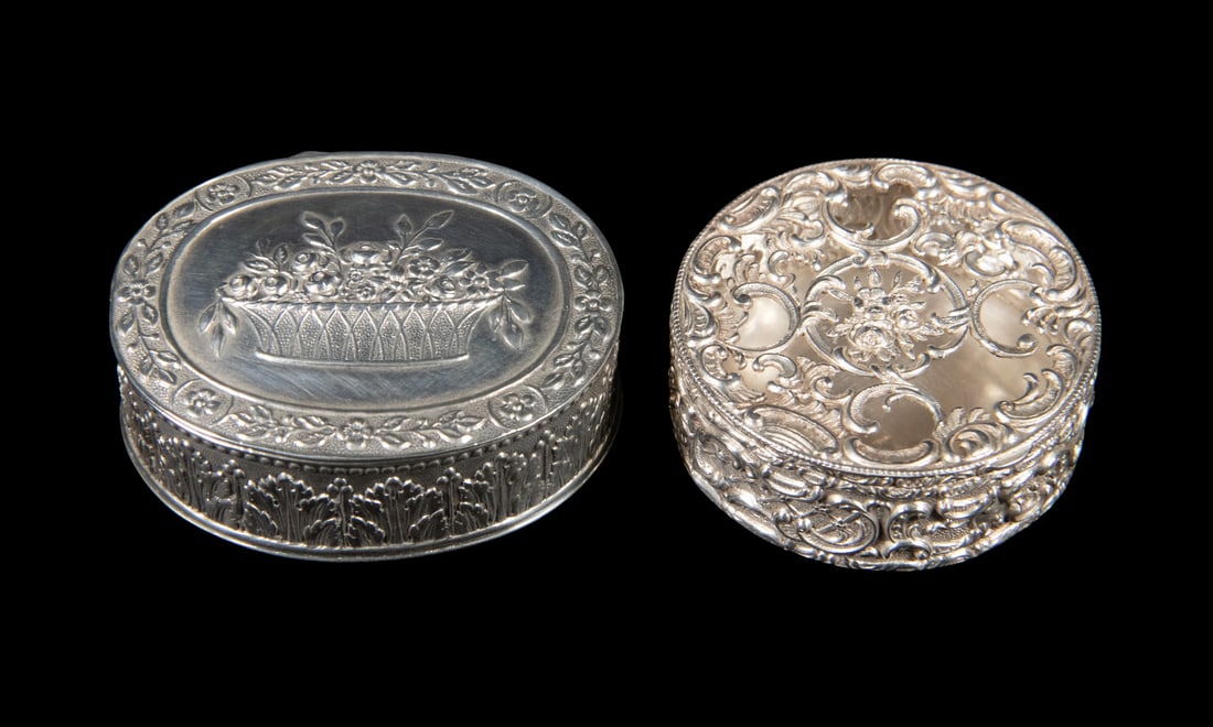 (2) GERMAN SILVER HINGED LID BOXES: Including: Oval repousse decorated box with floral decoration, gilt washed interior, stamped JZK or J2K on base (unknown German maker); and Round vanity box with pierced lid, repousse sides, unmarked,