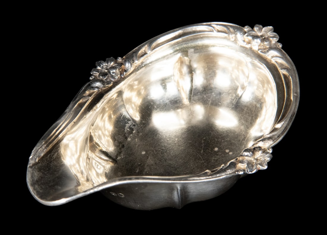 WILLIAM IV PERIOD STERLING SILVER PAP BOAT: English Sterling Silver Spouted Vessel, hallmarked for London 1835 by Joseph Angell I & John Angell I, with floral decorated rim. 2.45 ozt.OS: 1 1/4 x 5 x 3 1/2 in. (3.2 x 12.7 x 8.9 cm.)