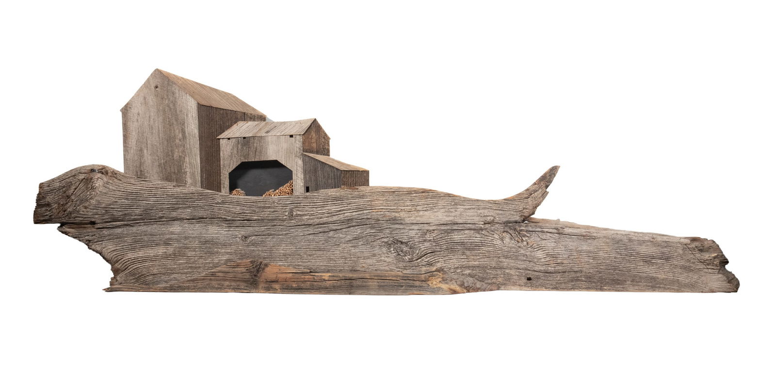 JOHN W. LONG (CONTEMRPORARY, MAINE): Hillside Barns, weathered wood wall-hanging relief. Signed and titled verso, also with address stamp and pasted-on artist's statement.OS: 18 x 59 in. (45.7 x 149.9 cm.)