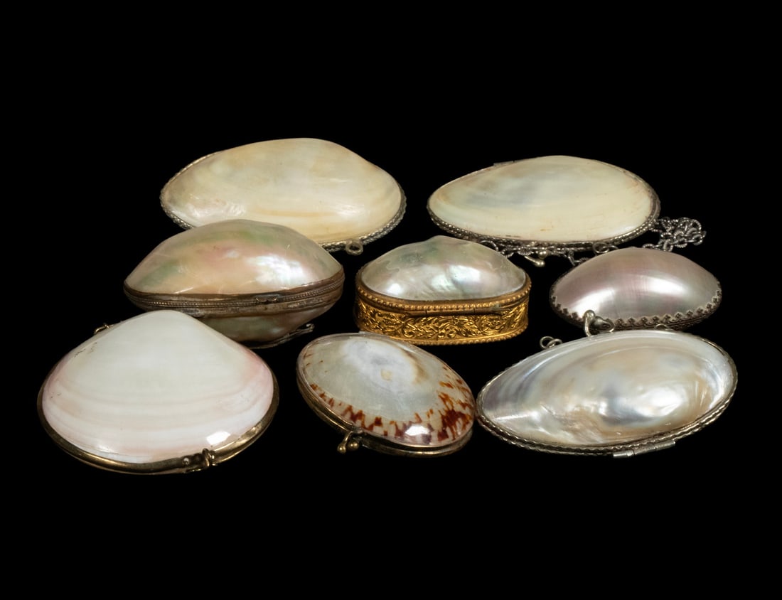 (8) MOTHER-OF-PEARL SHELL PURSE BOXES, PROBABLY EUROPEAN: A group of eight (8) small hinged containers or coin purses, each formed from natural shell—primarily mother-of-pearl or abalone—with metal rims, clasps, and mounts. The assortment