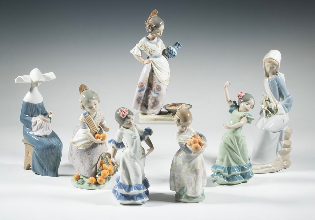 (7) LLADRO PORCELAIN FIGURINES: Collection of (7) Spanish Porcelain Figures, incl: Seated nun sewing; Girl with lilies; Girl making paella; Valencian girl with oranges; Valencian girl with basket of oranges; Girl flamenco dancer,