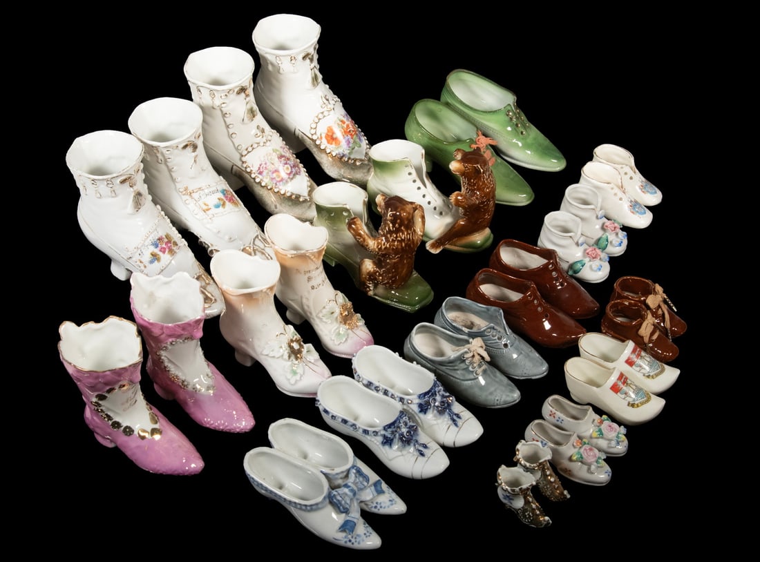 (16) PAIRS OF PORCELAIN SHOE FIGURINES, 20TH CENTURY: An assorted collection of sixteen porcelain miniature shoes and boots from various regions, each uniquely decorated. Includes two marked Made in Occupied Japan, a commemorative pair inscribed