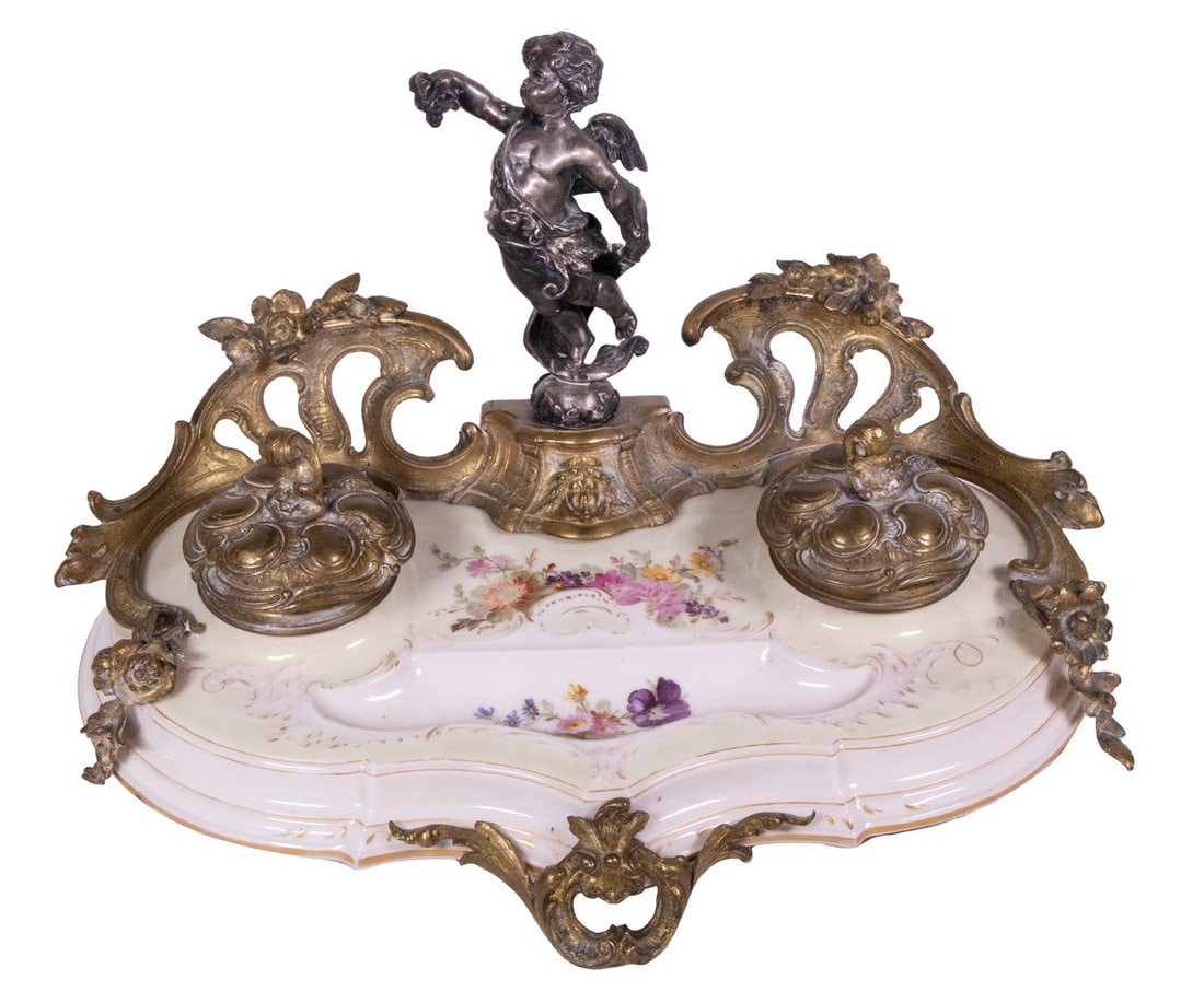KPM BERLIN SEGER PORCELAIN INKSTAND: Circa 1900 Art Nouveau Design Brass Mounted Berlin Porcelain Standish, having a hand painted porcelain platform supporting two brass inkwells with hinged lids, with brass front foot and galleried