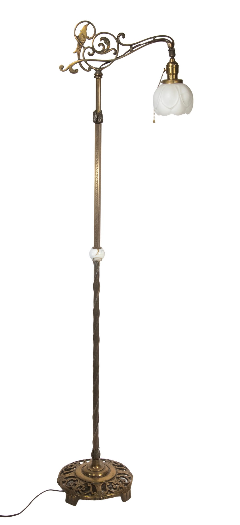 CIRCA 1930 BRASS & ONYX BRACKET FLOOR LAMP: Scrollwork bracket with bird entwined, square etched stem above onyx sphere, twisted brass below, resting on round and domed pierced base, matching the bracket, single down socket with frosted glass