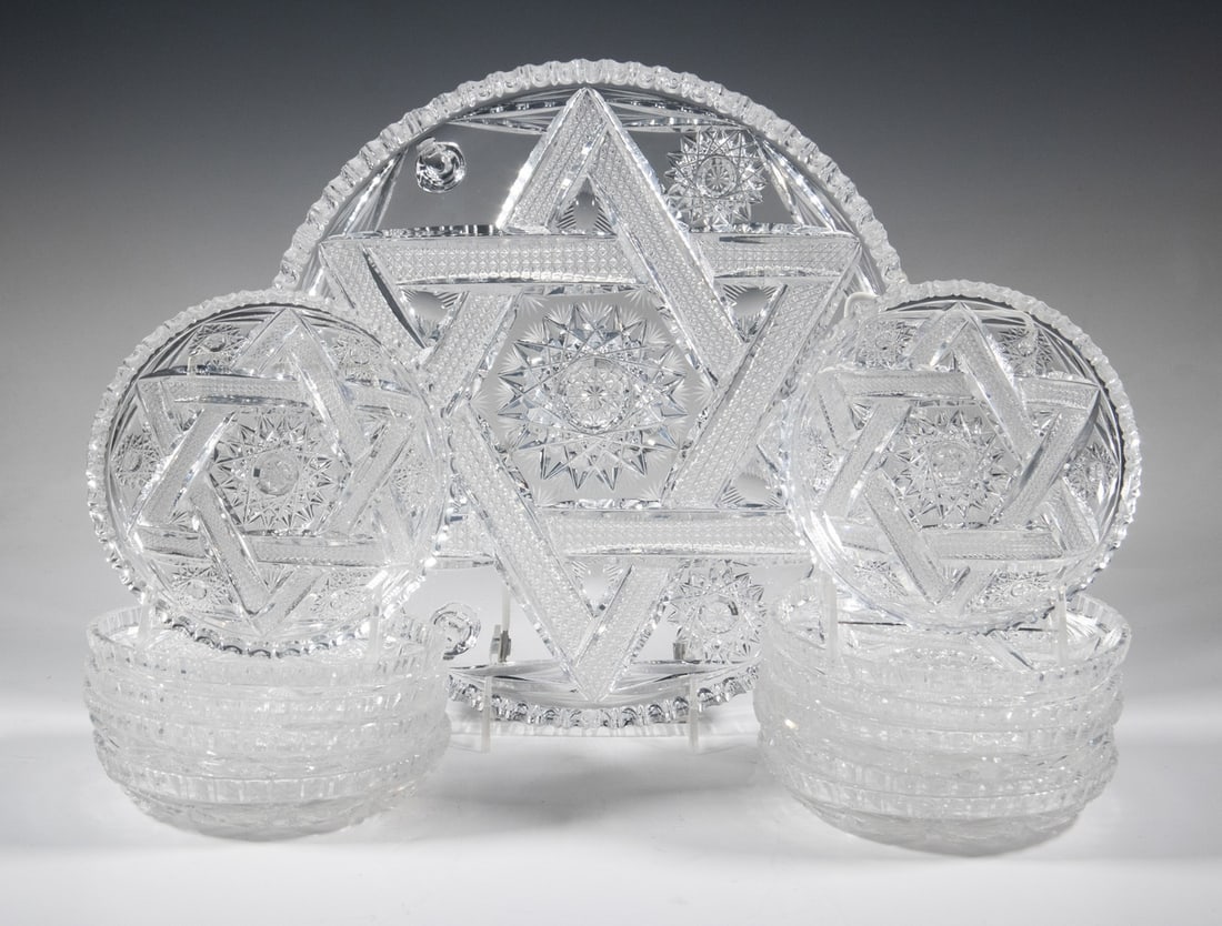 (12 PC) CUT CRYSTAL TRAY & PLATE SET WITH STAR OF DAVID: Clear Cut Crystal Serving Set, each piece with cut Judaica design and hobstar embellishments, incl: Large footed tray, 12 1/4" diam.; and (11) Plates, 6" diam.LGST Diameter: 12 1/4 in. (31.1 cm.),