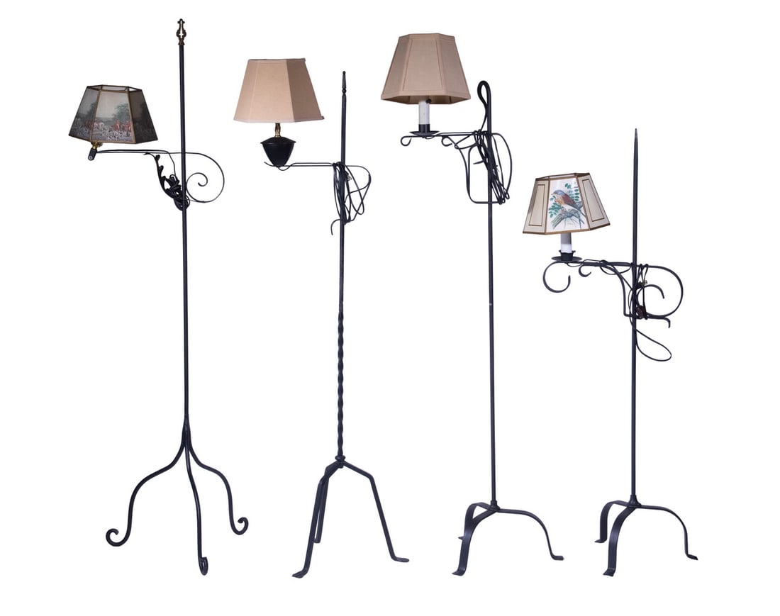 (4) BLACK WROUGHT IRON FLOOR LAMPS: Collection of Adjustable Height Lamps, all four single socket fixtures with shades.LGST Height: 63 in. (160 cm.), SMST Height: 52 1/2 in. (133.4 cm.)