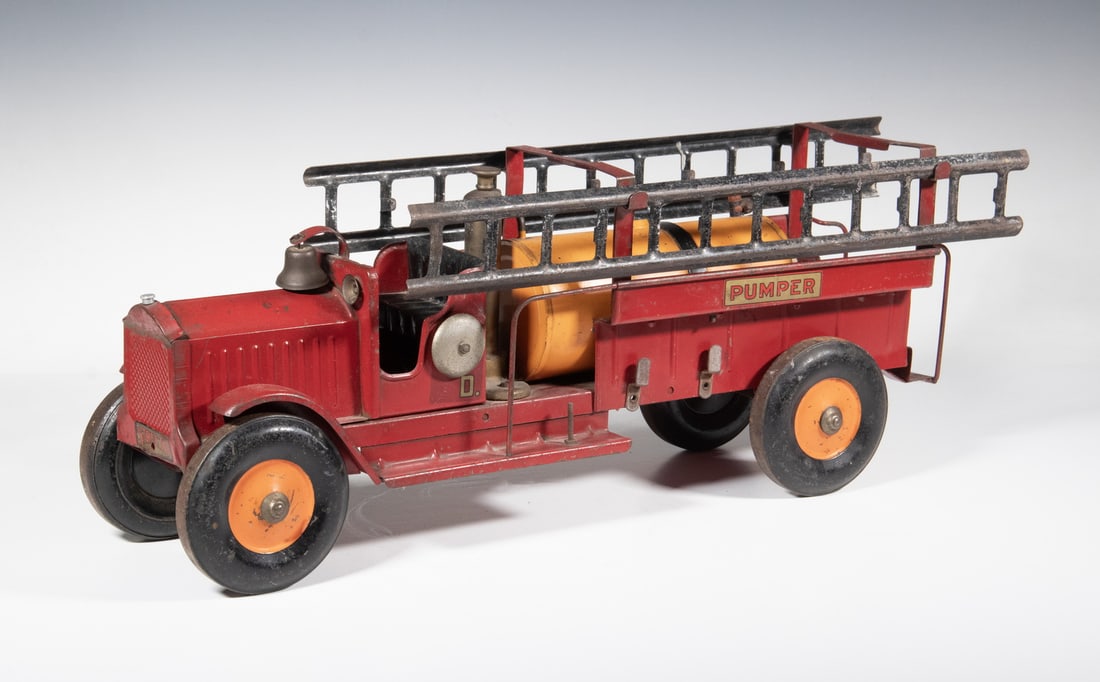 STRUCTO PRESSED-STEEL TOY FIRE TRUCK WITH LADDERS, c. 1920s–30s: A large Structo pressed-steel fire truck in red paint, featuring dual removable ladders, side running boards, bell, and rear water tank. Classic early Structo construction with original orange wheels
