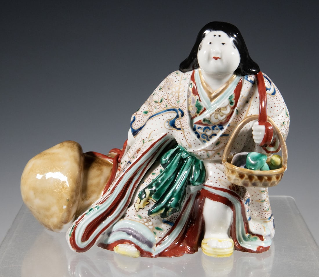 JAPANESE PORCELAIN FIGURE OF OKAME WITH MUSHROOM, MEIJI PERIOD (1 of 3)