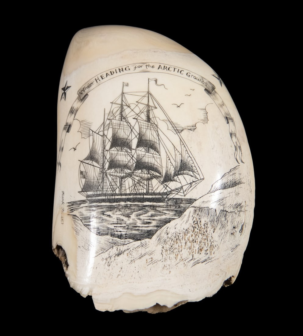 FRANK BARCELOS SCRIMSHAWN WHALE'S TOOTH WHALING SHIP: Heading for the Arctic Grounds, an arctic scene, with riband valance, signed, circa 1980, vertical. 10.0 oz.Frank Barcelos was born in the Azores islands (Portugal) before moving to New Bedford,