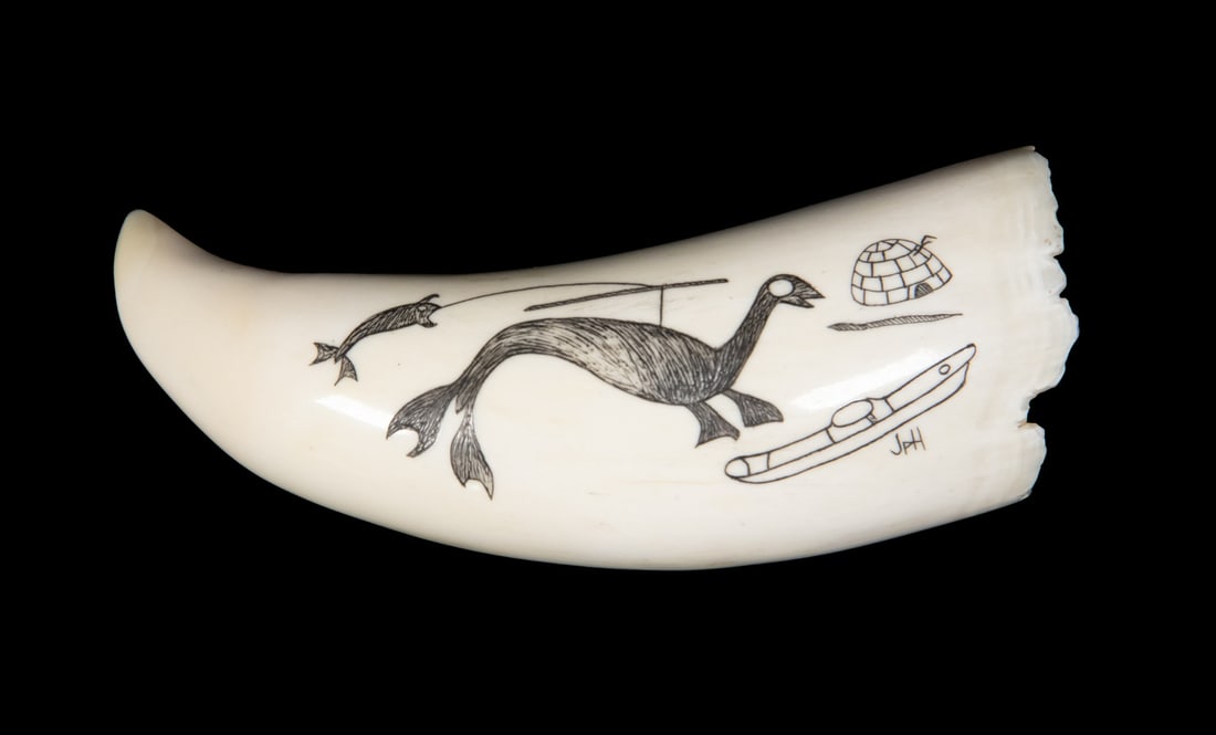 PHILLIP HAYDE SCRIMSHAWN SMALL WHALE'S TOOTH INUIT STYLE: Primitive Style with Seals, Igloo and Kayak, initialed JPH (Phillip Hayde, Seattle, WA), horizontal. 4.25 oz.Size: 4 in. (10.2 cm.)