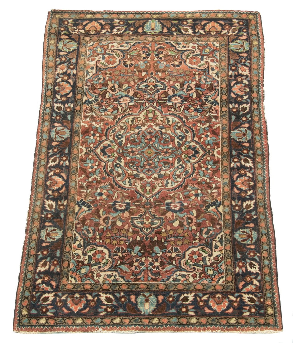 BORCHALOU HAMADAN RUG (3'3" X 5'): Northwest Persia, 2nd quarter 20th Century. Featuring a rosette medallion with anchor pendants and matching spandrels in gold, sky and midnight blue; rust, and aubergine on the rust field with a midni