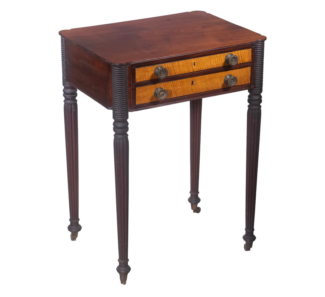19TH C. NORTH SHORE AMERICAN MAHOGANY & MAPLE STAND W/ TWO DRAWERS: Quality Stand in mahogany with tiger maple drawer fronts, cookie corners with stacked ring stiles, bowed reeded legs ending in brass casters, the drawers with pressed brass knobs, pine secondary, part
