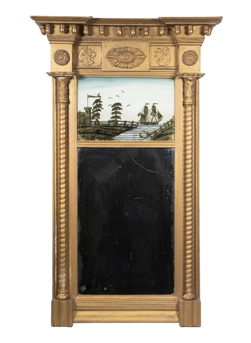1814 EGLOMISE FEDERAL HALL MIRROR: Reverse Painted Glass of War Ship Passing Castle at River Ford, dating to 1814, with fourteen pendant acorns, frieze featuring cherub and rosette appliques, mirror flanked by twist columns, the frame