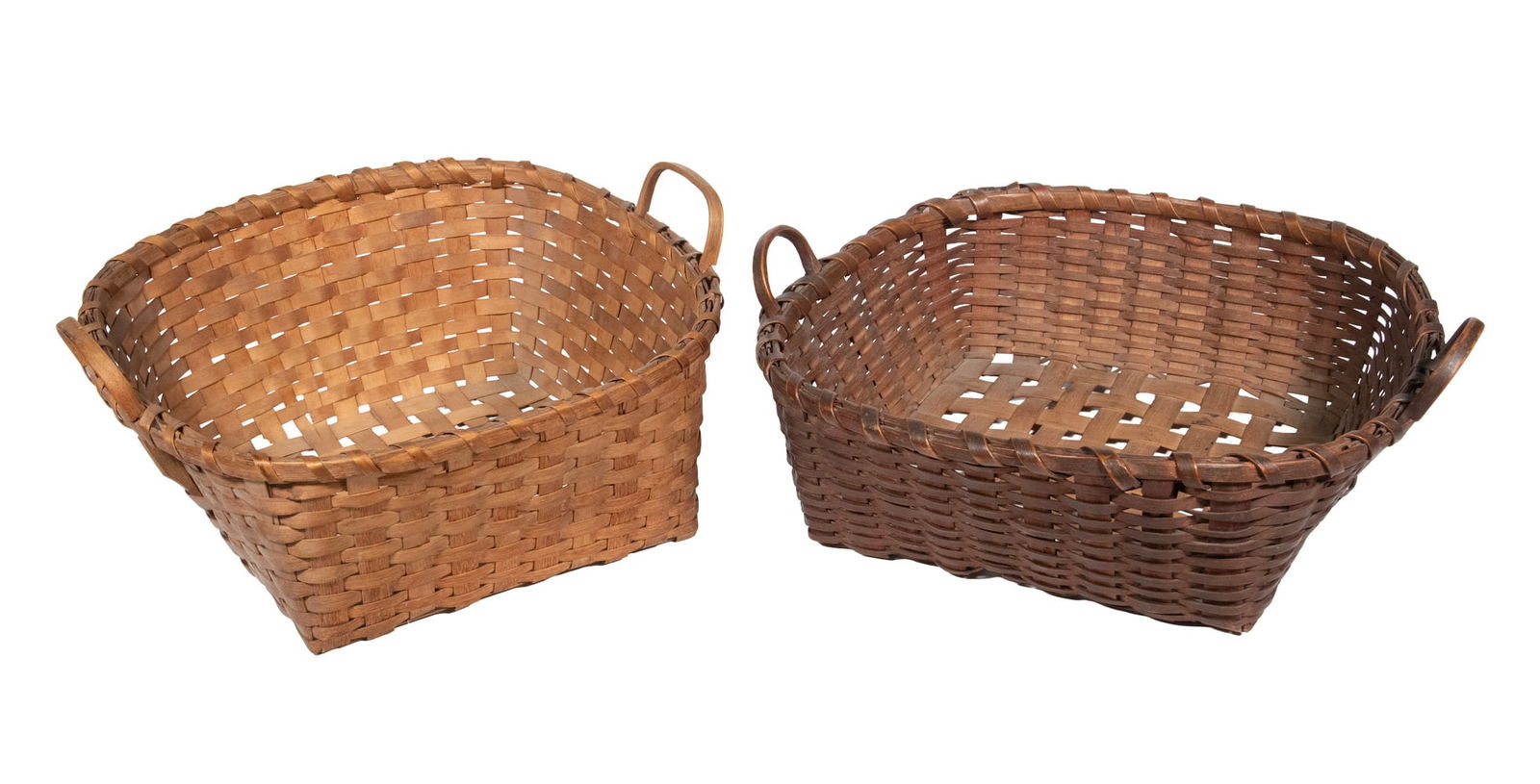 (2) NEW ENGLAND SPLINT UTILITY BASKETS, LATE 19TH–EARLY 20TH CENTURY: A group of two hand-woven ash-splint New England utility baskets, each with bentwood side handles and a wrapped rim, exhibiting traditional regional farmhouse construction. Natural aged surface and
