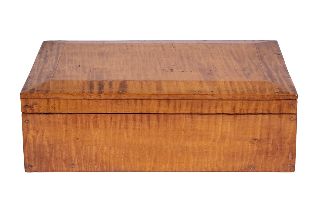 VINTAGE TIGER MAPLE LIFT-TOP BOX: A rectangular box crafted from tiger maple with striking striped grain and warm honey finish. The interior lined with felt. The lid attached with simple hinges, showing separation at the joint. 4 x 12
