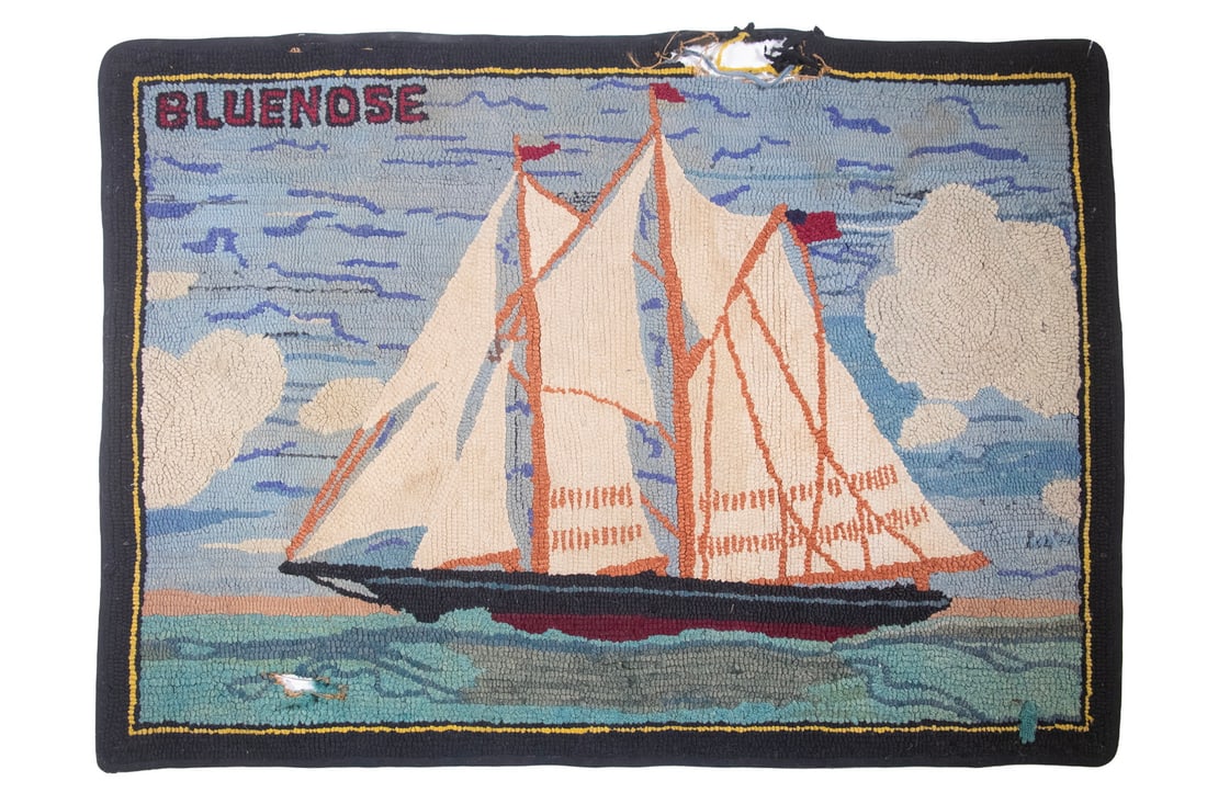 HOOKED RUG "BLUENOSE" SCHOONER MID 20TH C.: Two Mast Schooner underway, port side view.Size: 29 x 41 in. (73.7 x 104.1 cm.)