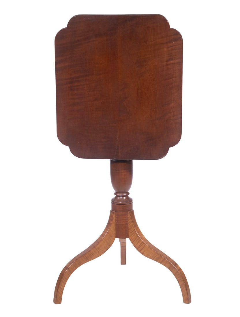 TIGER MAPLE TILT-TOP CANDLESTAND: Federal Period Stand, ca. 1800, with ovolo top, vasiform pedestal, tripod base with spider legs.27 x 18 1/2 x 16 in. (68.6 x 47 x 40.6 cm.)