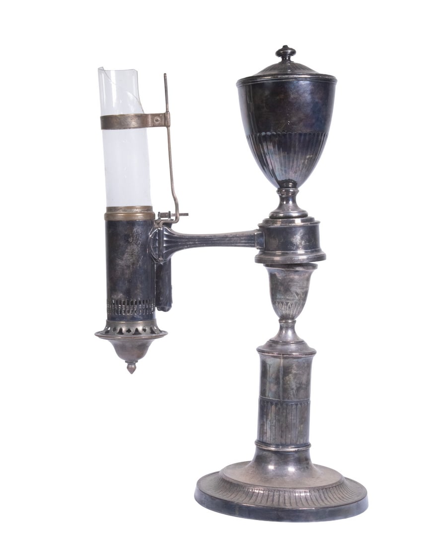 CIRCA 1800 ENGLISH SILVER-PLATE ARGAND OIL LAMP: English Early 19th c. Silver on Copper Single Burner Argand Lamp, with candlestick form weighted base, detachable font. Loss to top of glass chimney.15 1/2 x 8 1/2 x 6 in. (39.4 x 21.6 x 15.2 cm.)