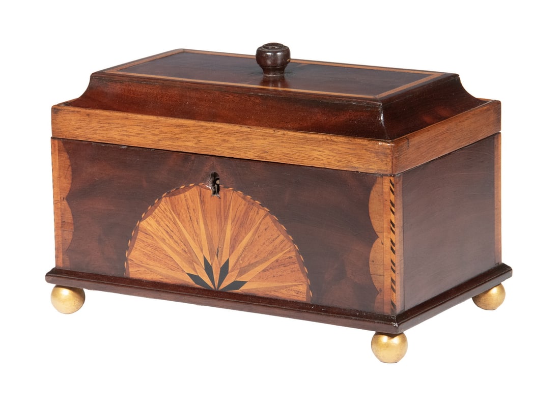 19TH C. ENGLISH CHIPPENDALE THREE-BAY TEA BOX: Coffin Top Tea Box in mahogany with boxwood trim, the face with inlaid fan, lobed ends, small knop on top, interior retaining the original roped inlay edge lids, the interior of the lid in original gr